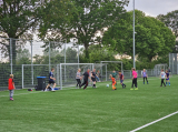 Laatste training S.K.N.W.K. JO11-1JM (partijtje tegen de ouders) van maandag 27 mei 2024 (79/137)